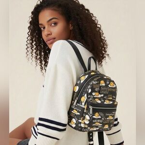 Rare Sanrio Gudetama x Loungefly Mini Backpack in black colorway.